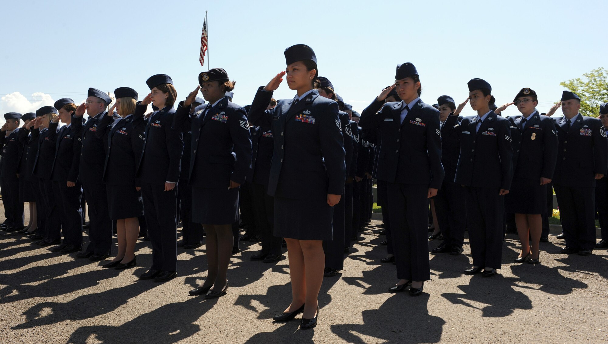 MOUNTAIN HOME AIR FORCE BASE, Idaho - Members of the 366th Fighter Wing salute the flag while taps play during the Memorial Day Ceremony held at Mountain View Cemetery in Mountain Home May 25. Gunfighters and citizens of Mountain Home came together to pay respect to fallen veterans. Memorial Day was originally known as Decoration Day because it was time set aside to pay respect to the Civil War dead by strewing flowers or "decorations" on the graves of fallen comrades. (U.S. Air Force photo by Airman 1st Class Debbie Lockhart)