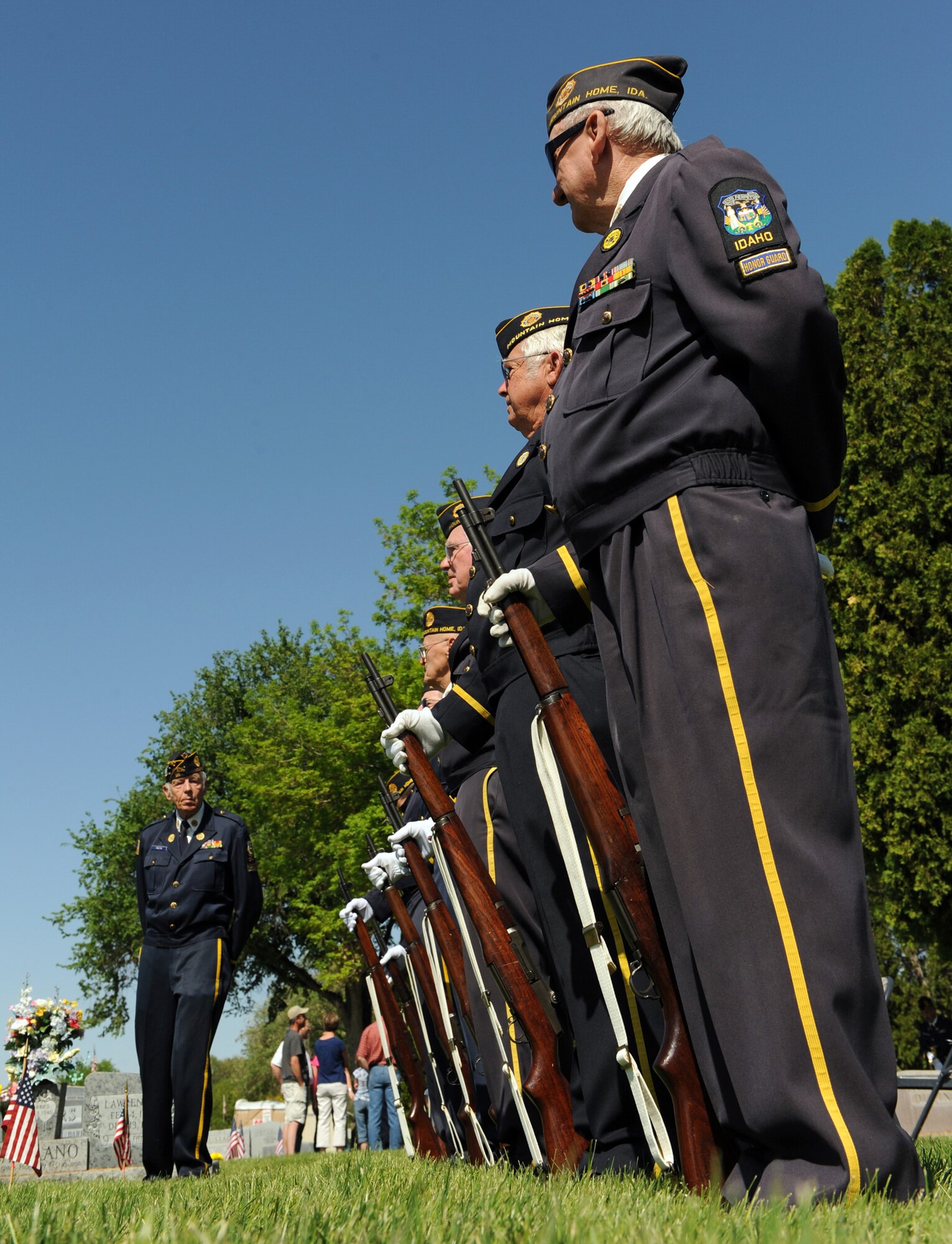 MOUNTAIN HOME AIR FORCE BASE, Idaho - Members of the American Legion Post 26 Honor Guard get into place during a Memorial Day Ceremony held at Mountain View Cemetery in Mountain Home May 25. Gunfighters and citizens of Mountain Home came together to pay respect to fallen veterans. Memorial Day was originally known as Decoration Day because it was time set aside to pay respect to the Civil War dead by strewing flowers or "decorations" on the graves of fallen comrades. (U.S. Air Force photo by Airman 1st Class Debbie Lockhart)