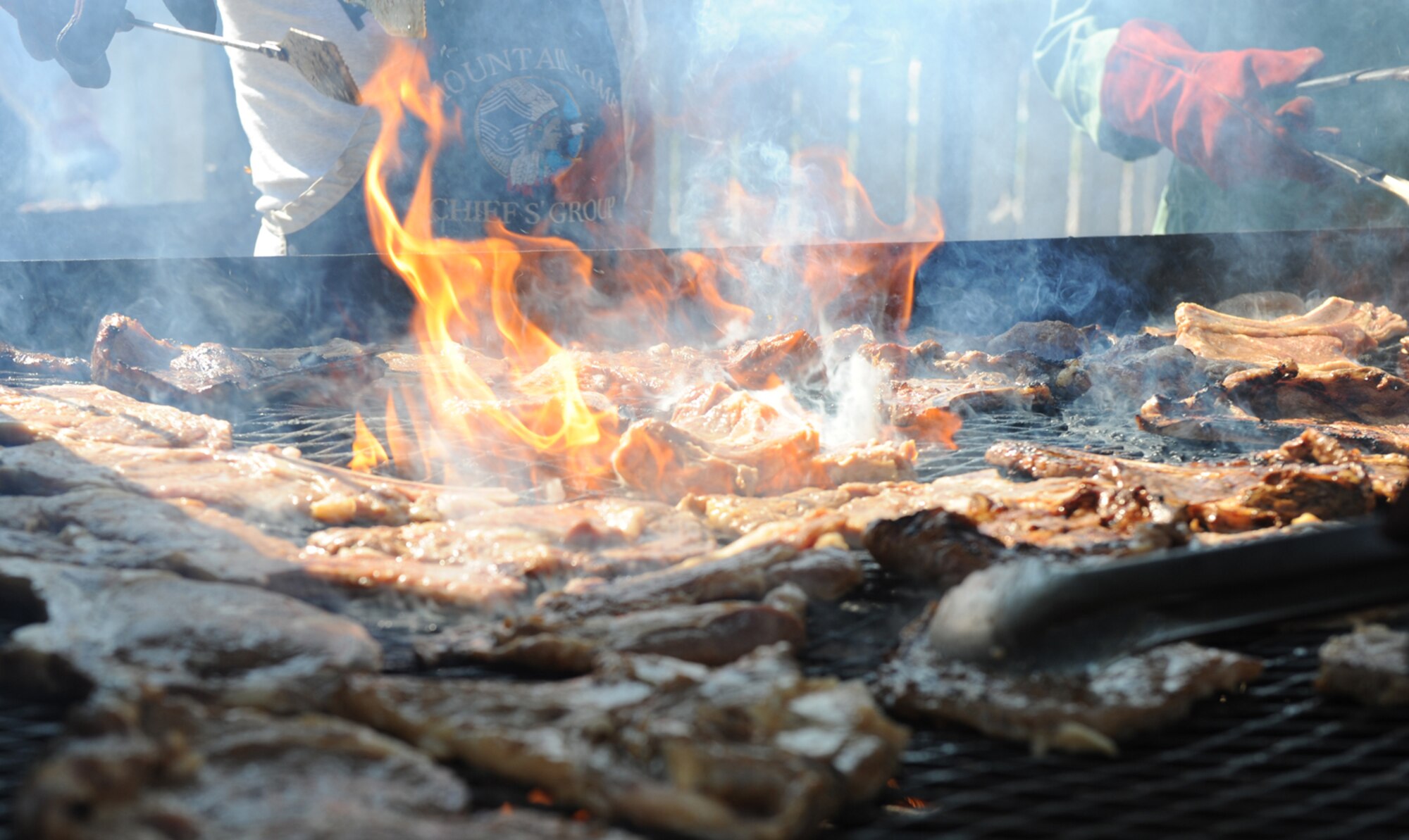 MOUNTAIN HOME AIR FORCE BASE, Idaho - Chief master sergeants gather at the Community Center to grill steaks during the Chiefs Steak Burn May 20. The money raised from the steak burn gets distributed to various organizations for their awards throughout Mountain Home Air Force Base. The next steak burn is scheduled June 17 at the Community Center from 11 a.m. to 1 p.m. (U.S. Air Force photo/ Airman 1st Class Renishia Richardson)