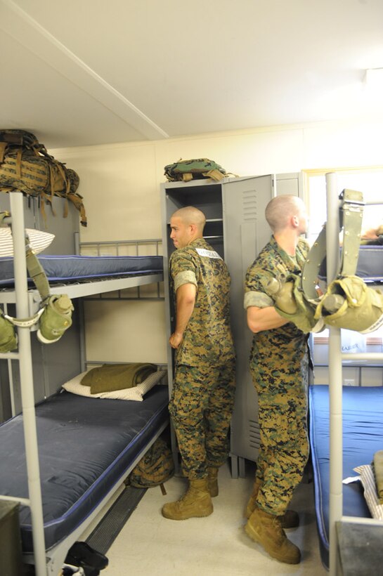 Candidates from Echo Company, Officer Candidate School,  meet their instructor staff on pick-up day and are given a taste of how their training will be conducted while aboard Marine Corps Base Quantico, Va., Wednesday, May 27, 2009. The candidates face 6-weeks of rigorous and demanding training that serves to screen and evaluate their leadership skills and determine whether they can efficiantly lead Marines. (U.S. Marine Corps photo by LCpl John Kennicutt/Not Released)