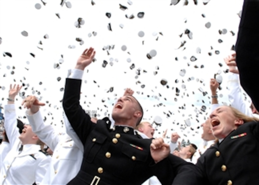 Newly Commissioned U S Navy Ensigns And Marine Corps 2nd Lts Toss Their Hats In The Air To