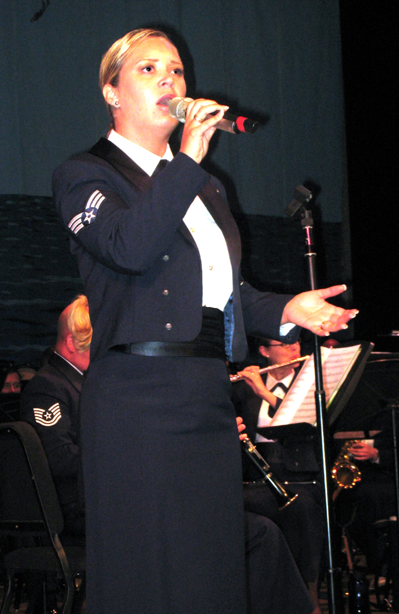 Senior Airman Pamela MacKenzie, a vocalist with the United States Air Force Band of the Golden West, performs “Habanera” from the opera “Carmen” during a concert at Ramona High School in Riverside, Calif. (U.S. Air Force photo by 2nd Lt. Zach Anderson)