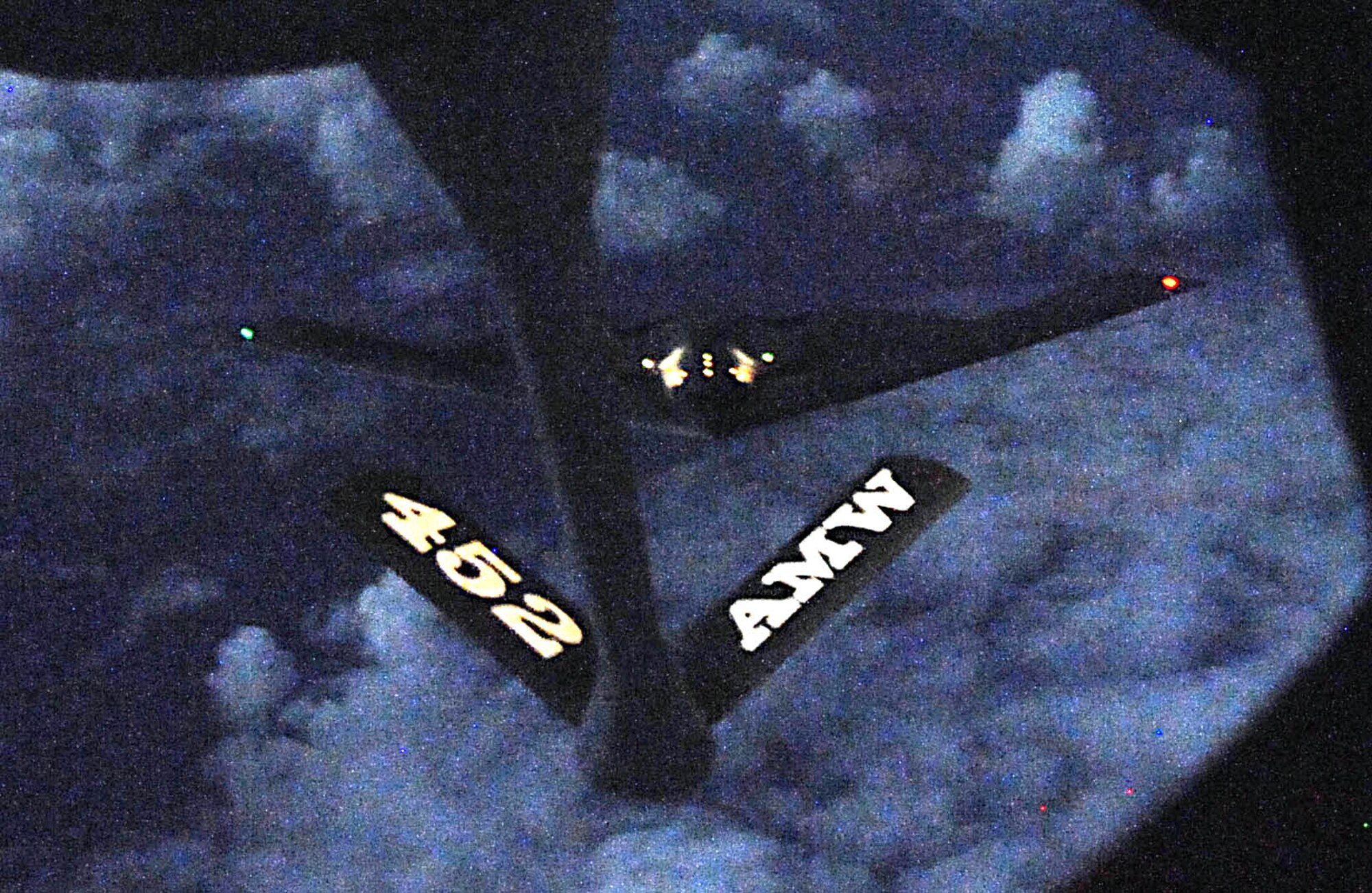 A B-2 Spirit approaches the boom of a deployed Stratotanker from the 452nd Air Mobility Wing. The deployed reservists assigned to the 506th Expeditionary Air Refueling Squadron supported two bombers during a 24-hour training mission flying more than 10,000 miles roundtrip. (U.S. Air Force Photo by Senior Airman Christopher Bush)