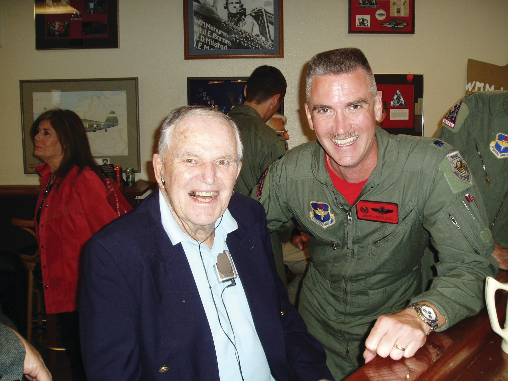 Lt. Col. Jeffery Lovelace, 56th Fighter Wing director of staff and former 63rd FS commander, and Bud Mahurin, former member of the 63rd Fighter Squadron and World War II and Korean War fighter ace, visit together in the 63rd FS heritage room 
March 2007. (U.S. Air Force photo/ Airman 1st Class Tracie Forte)