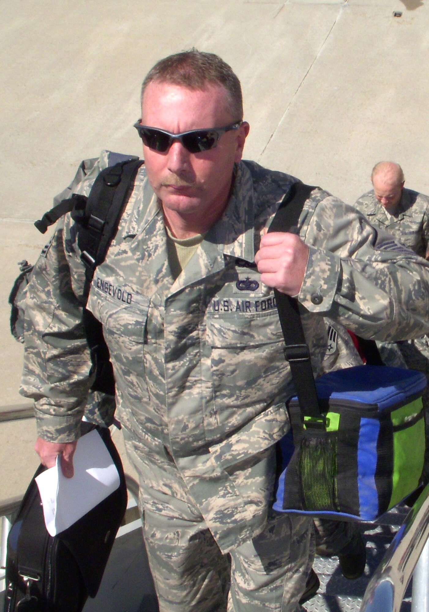 Master Sgt. Robert Engevold, an Air Reserve Technician with the 302nd Communications Flight, boards a KC-135 May 27 bound for Ramstein Air Base, Germany. More than 20 members of the 302nd CF departed Peterson Air Force Base, Colo., for two weeks to perform annual tour duty in support of Ramstein's communication mission. Many active duty Airmen in the communications career field at the air base have been forward deployed to Iraq and Afghanistan in support Operations Iraqi and Enduring Freedom. The KC-135, based at McConnell AFB, Kan., is assigned to the AF Reserve's 931st Air Refueling Group. (U.S. Air Force photo/Senior Airman Stephen J. Collier)