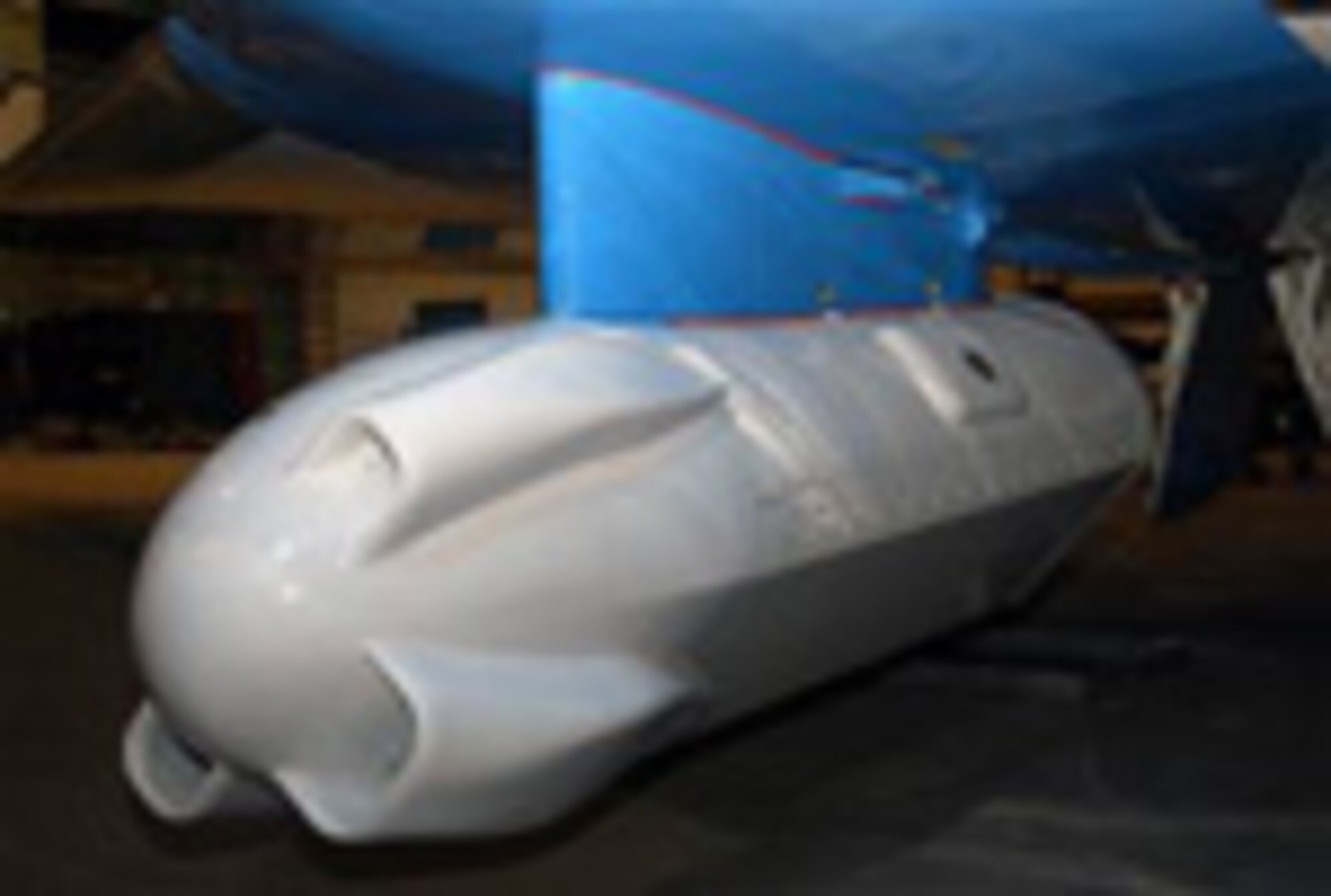 This pod attached to the bottom of NASA's Gulfstream III aircraft contains the civilian world's first L-band synthetic aperture radar meant to measure ice flow and thickness several hundred feet under the ice’s surface. Another radar will survey the ice's surface as a NASA operation staged at Thule from May 2 to June 8 makes multiple passes over the Greenland and Iceland ice caps. The purpose of the operation is to support the international polar year organization that tracks changes in the Earth's arctic regions and test the two radars, which may be used in future space-based platforms (Air Force photo by 1st Lt. Lisa Meiman).  