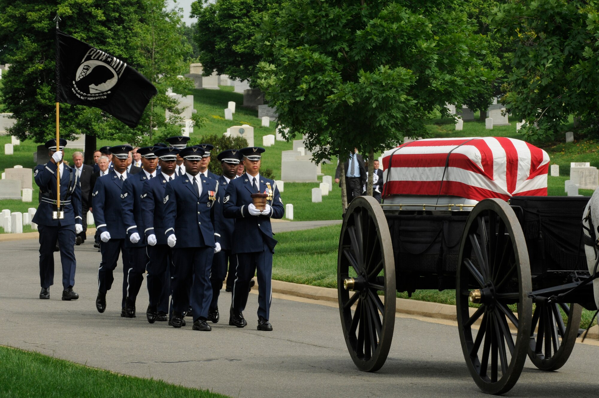 Members of a U.S. Air Force Honor Guard body bearer’s element carry the remains of former Chief Master Sgt. of the Air Force Paul W. Airey, during a funeral in his honor  May 28, at Arlington National Cemetery in Arlington Va. Former CMSAF Airey was adviser to Secretary of the Air Force Harold Brown and Chief of Staff of the Air Force Gen. John P. McConnell on matters concerning welfare, effective utilization and progress of the enlisted members of the Air Force. Former CMSAF Airey was the first chief master sergeant appointed to this ultimate noncommissioned officer position and was selected from among 21 major air command nominees to become the first chief master sergeant of the Air Force. (U.S. Air Force photo by Staff Sgt. Dan DeCook)