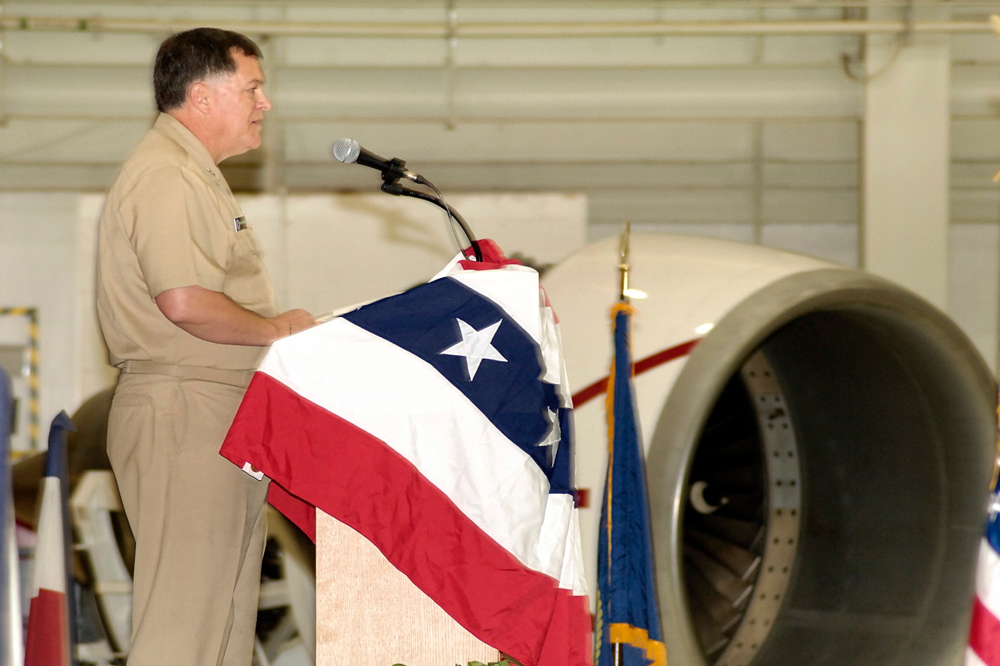 Lauding the efforts of all involved, Rear Adm. Mark Skinner, program executive officer, Tactical Aircraft Programs, talks about the longevity of the CFM56-2A-2 engine that remained on wing for 19,655 hours. A celebratory ceremony was held recently at Tinker Air Force Base. (Courtesy photo) 
