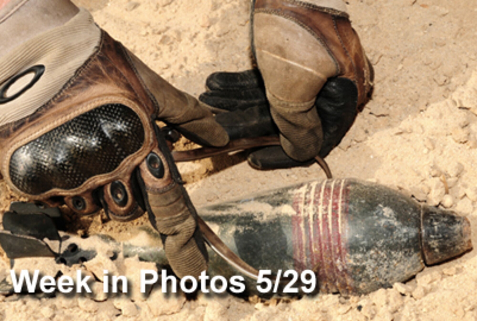 Air Force Week in Photos for May 29 highlights photos from around the Air Force. In this photo by Senior Airman Courtney Richardson, an Airman measures simulated unexploded ordnance with a caliper during training May 27 at an air base in Southwest Asia. (U.S. Air Force illustration)