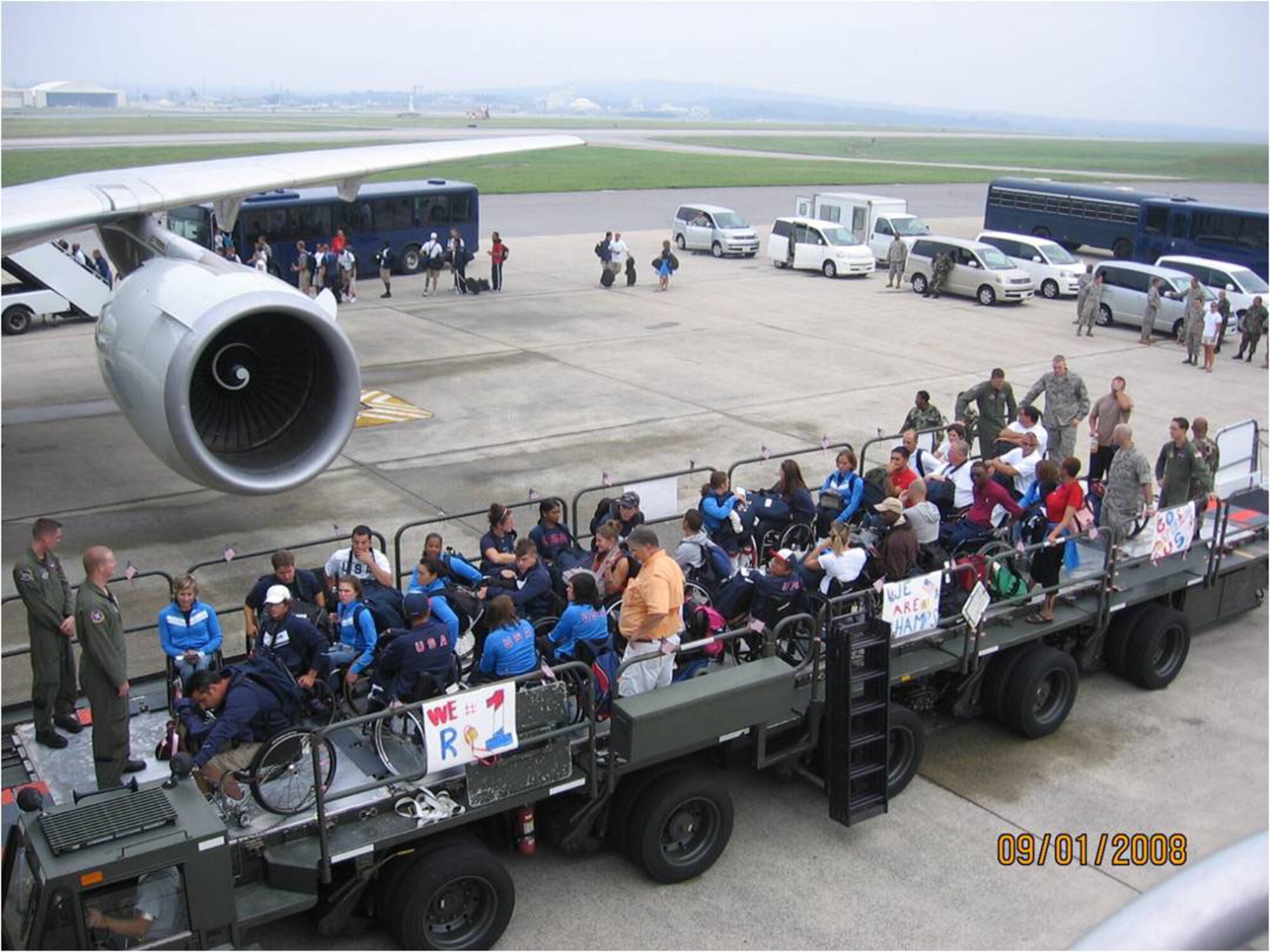 Airmen from the 733d Air Mobility Squadron at Kadena Air Base, Japan, specially configured a 60K-Tunner to support the safe loading and unloading operations of the 120 athletes of the U.S. Paralympics Team while they transited the base on their way to the games in Beijing China. The 733rd AMS is part of the 515th Air Mobility Operations Wing, which celebrated its one-year anniversary June 5. (Courtesy photo)  