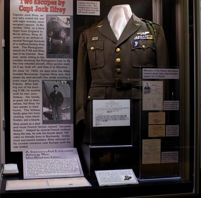 DAYTON, Ohio - Capt. Jack Ilfrey’s service coat. His winged boot for evading in France is on the left breast pocket. This is part of the Winged Boot: Escape and Evasion in World War II exhibit in the World War II Gallery at the National Museum of the U.S. Air Force. (U.S. Air Force photo)
