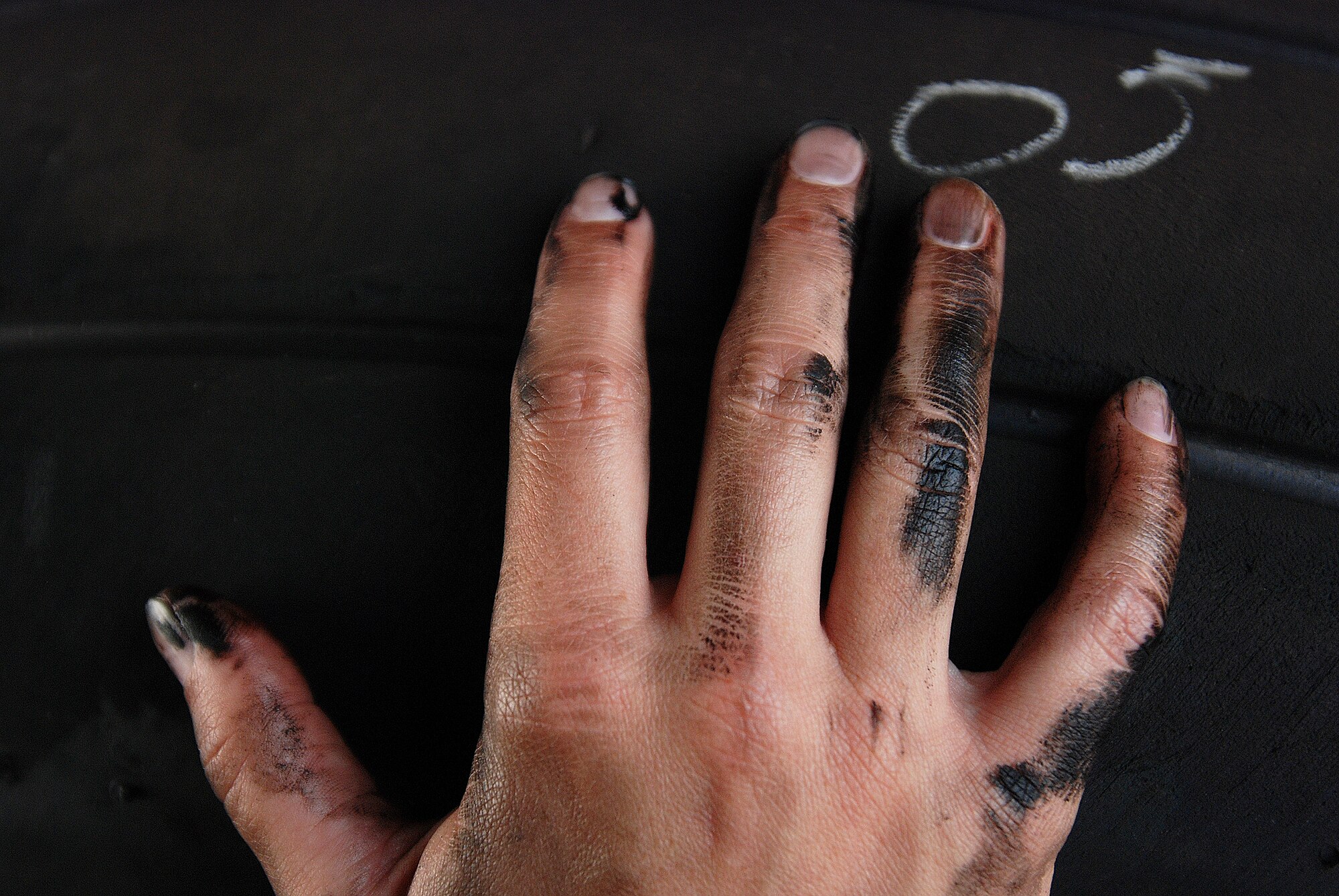 Staff Sgt. Mikela Kleinhans, a Reservist from the 433rd Airlift Wing's Aircraft Maintenance Squadron, goes through routine checks and inspections in a C-5A Galaxy cargo aircraft at Lackland AFB. Sergeant Kleinhans' job as a crew chief for a C-5 takes her all over the world with the crew of the aircraft. (U.S. Air Force photo/Airman Brian McGloin)