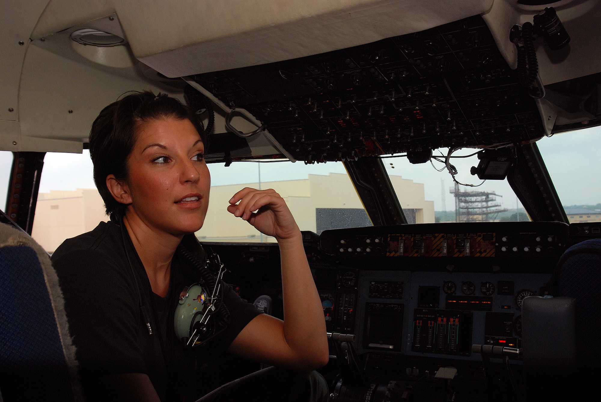 Staff Sgt. Mikela Kleinhans, a Reservist from the 433rd Airlift Wing's Aircraft Maintenance Squadron, goes through routine checks and inspections in a C-5A Galaxy cargo aircraft at Lackland AFB. Sergeant Kleinhans' job as a crew chief for a C-5 takes her all over the world with the aircraft. (U.S. Air Force photo/Airman Brian McGloin)