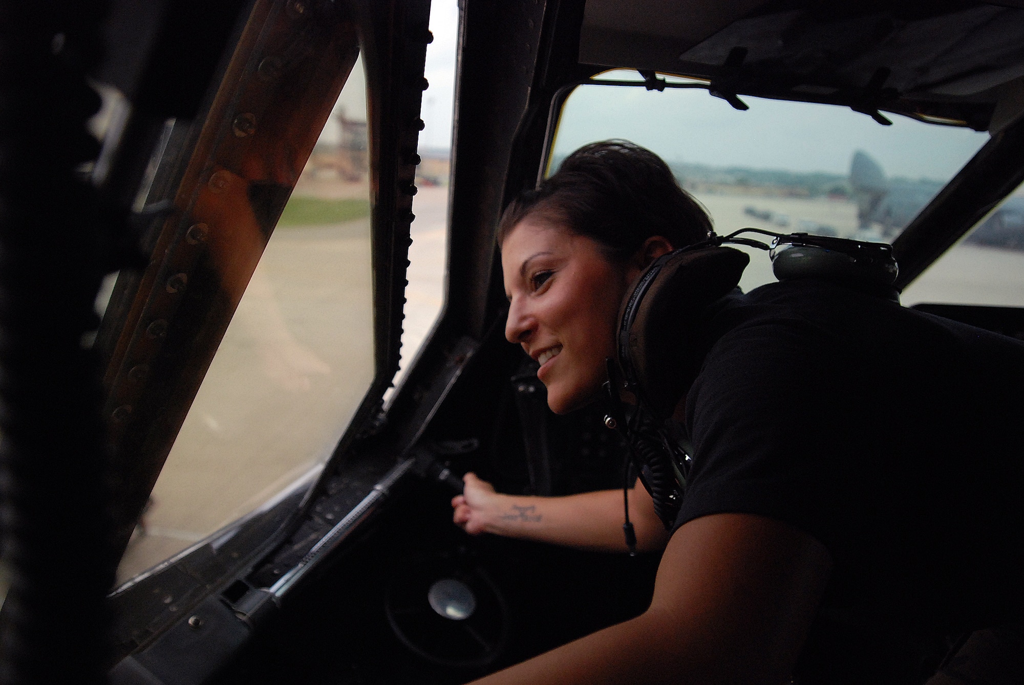 Staff Sgt. Mikela Kleinhans, a Reservist from the 433rd Airlift Wing's Aircraft Maintenance Squadron, goes through routine checks and inspections in a C-5A Galaxy cargo aircraft at Lackland AFB. Sergeant Kleinhans' job as a crew chief for a C-5 takes her all over the world with the aircraft. (U.S. Air Force photo/Airman Brian McGloin)