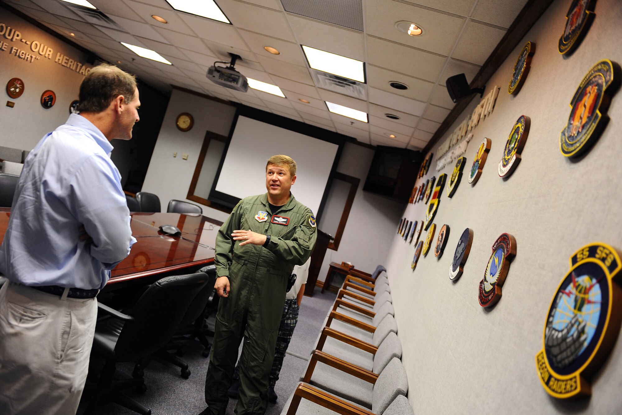 OFFUTT AIR FORCE BASE, Neb. - Lt Col. Chris L. Canada, 55th Wing director of staff, escorts Timothy K. Skipworth, son of Col. Billy L. Skipworth, who died in a Boeing EC-135N crash in the south pacific on June 13, 1971, during a tour of the Billy L. Skipworth Operations Center here May 23. Timothy was eight-years-old when his father died and the visit was his first since he was a young boy. Colonel Skipworth was the commander of the 2nd Airborne Command and Control Squadron. U.S. Air Force photo by Josh Plueger

U.S. Air Force Photo by Josh Plueger
