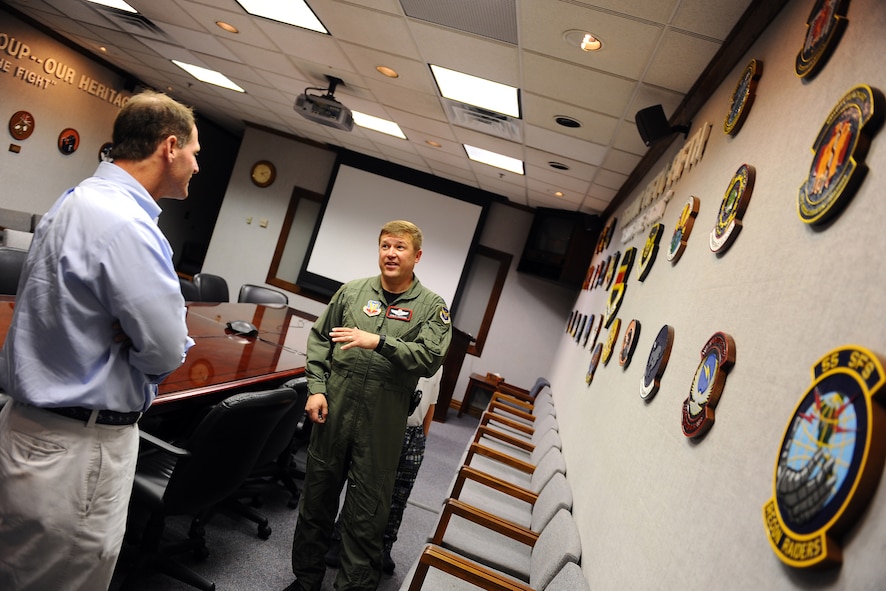 OFFUTT AIR FORCE BASE, Neb. - Lt Col. Chris L. Canada, 55th Wing director of staff, escorts Timothy K. Skipworth, son of Col. Billy L. Skipworth, who died in a Boeing EC-135N crash in the south pacific on June 13, 1971, during a tour of the Billy L. Skipworth Operations Center here May 23. Timothy was eight-years-old when his father died and the visit was his first since he was a young boy. Colonel Skipworth was the commander of the 2nd Airborne Command and Control Squadron. U.S. Air Force photo by Josh PluegerU.S. Air Force Photo by Josh Plueger