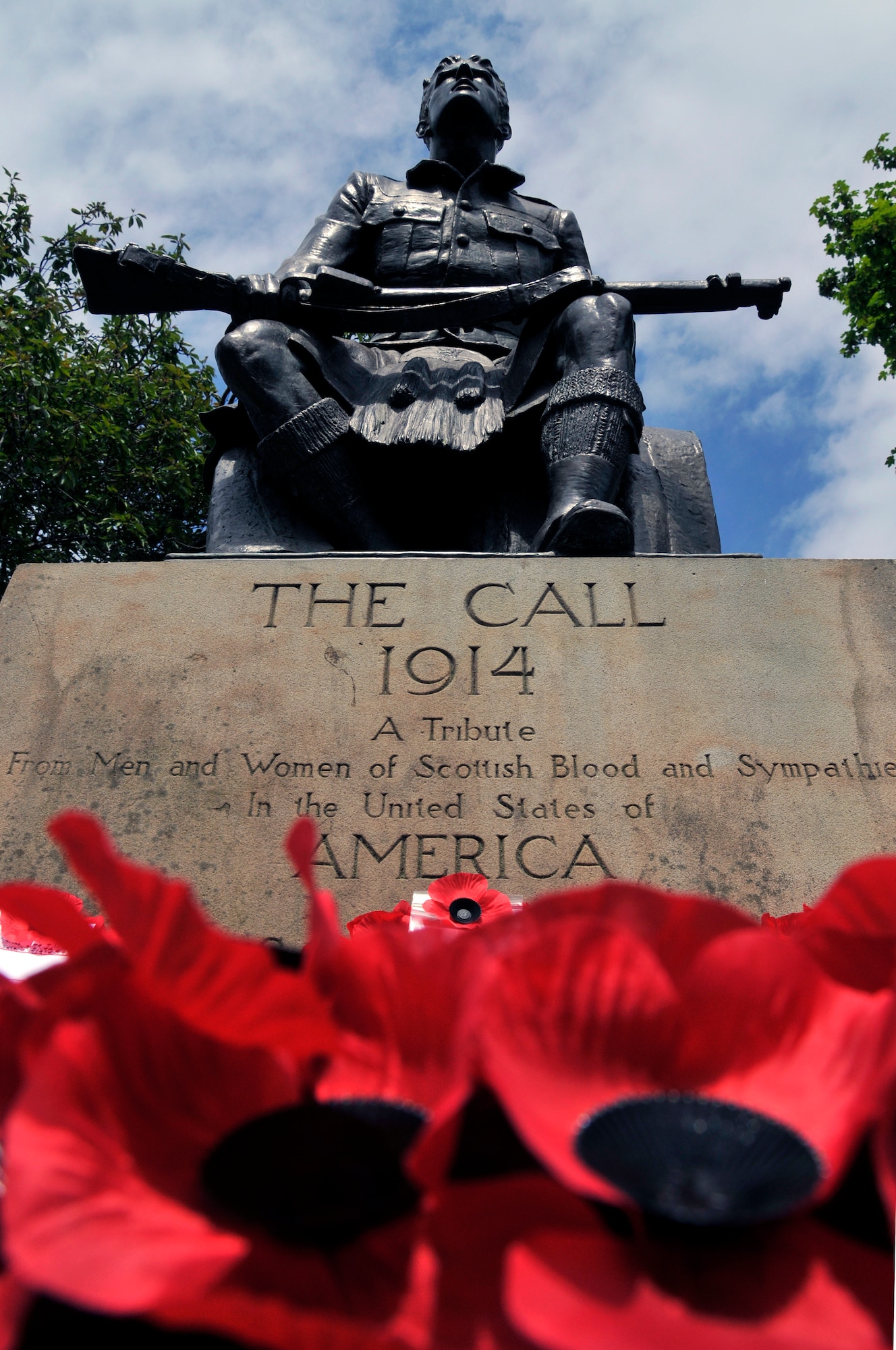 Poppy wreaths lay at the base of the Scottish-American War Memorial May 25, 2009 in Edinburgh Scotland. The poppy is a major war remembrance symbol because of the poppies that bloomed across some of the worst battlefields of Flanders in World War I. Their red color is an appropriate symbol for the bloodshed of trench warfare. (U.S. Air Force photo by Airman 1st Class Perry Aston) (Released)