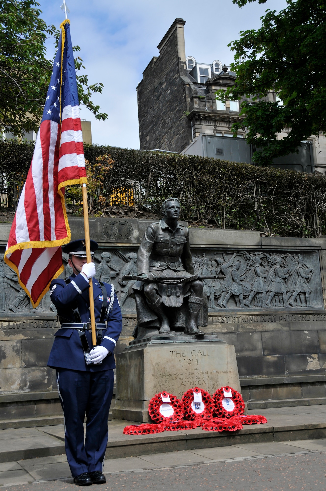 Staff Sgt. Christopher Ackerman, 48th Fighter Wing base honor guard, renders honors during the playing of the British and American National Anthems May 25, 2009 in Edinburgh Scotland. The Base Honor guard traveled over 400 miles to Edinburgh to participate in a tribute to the sacrifice made by Scottish-Americans during the First World War. (U.S. Air Force photo by Airman 1st Class Perry Aston) (Released)