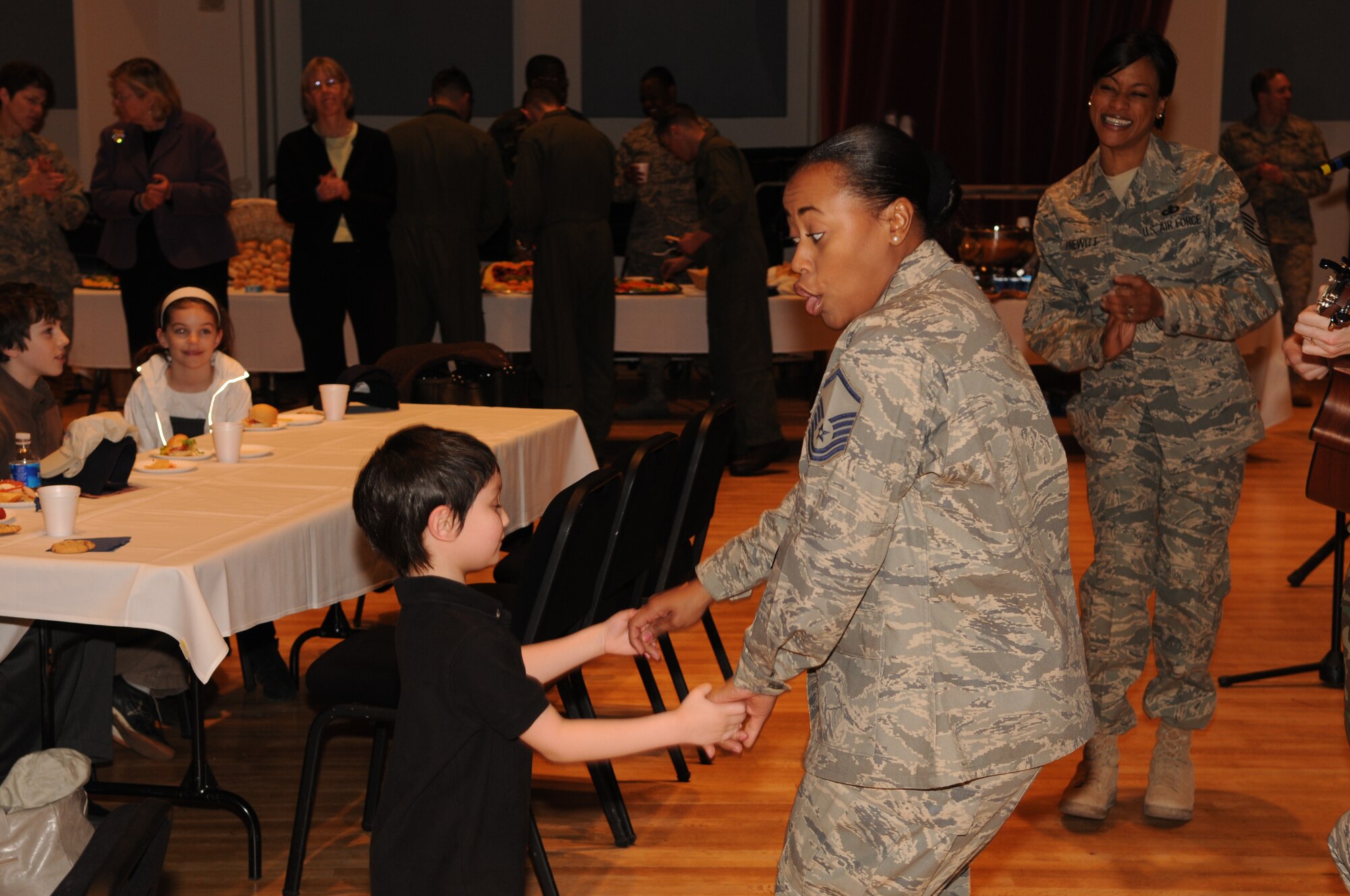Master Sgt. Regina Coonrod, a member of Max Impact, performs for
children from the Make-A-Wish Foundation.  Since 1980, the Make-A-Wish
Foundation has enriched the lives of children with life-threatening
medical conditions through its wish-granting work. (U.S. Air Force photo by Senior Airman Sean Adams)