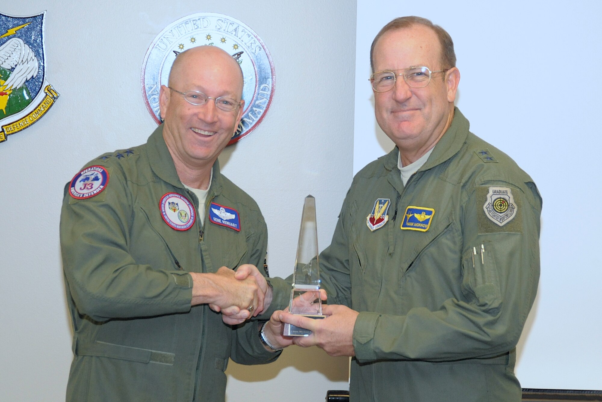 Gen. Gene Renuart presents the Partridge-Slemon award to Maj. Gen. Hank Morrow, commander of Continental U.S. NORAD Region May 7. CONR was designated NORAD's most outstanding unit in 2008 for its support of the common defense and partnership in protecting the U.S. and Canadian homelands.