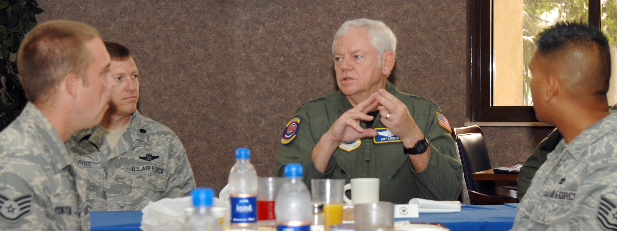 Gen. Arthur Lichte, Air Mobility Command commander, has breakfast with members of the 385th Air Expeditionary Group and 728th Air Mobility Squadron during his tour at Incirlik Air Base, Turkey, May 21, 2009. General Lichte used the breakfast as an opportunity to interact with the Airmen and answer their questions. U.S. Air Force photo/Staff Sgt. Lauren Padden. 
