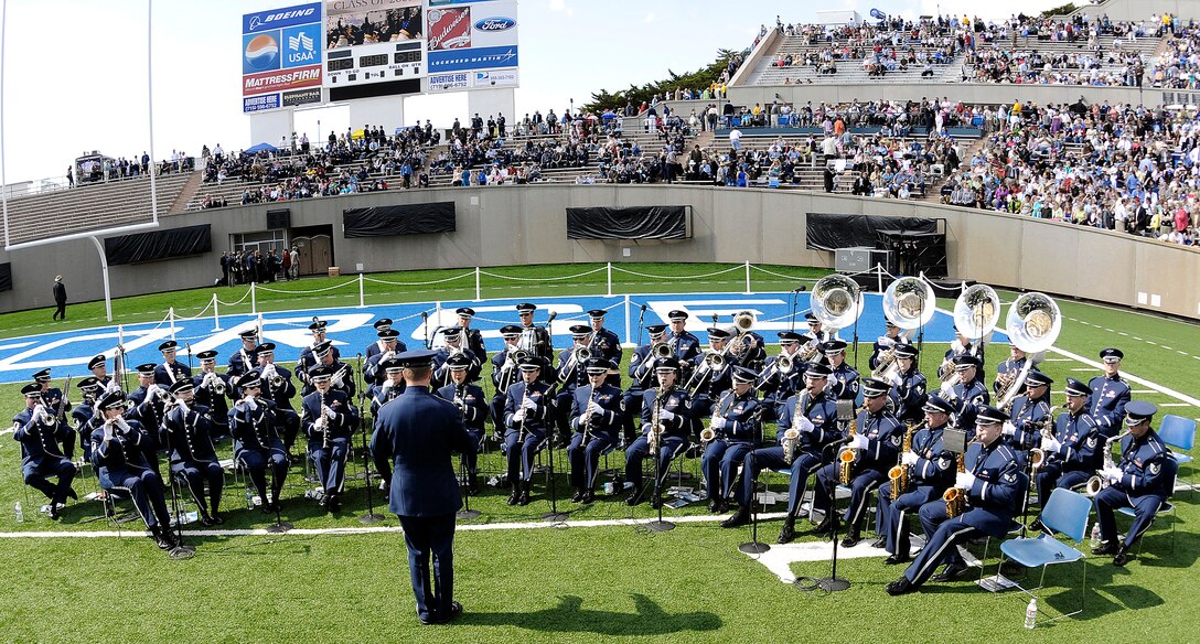 The U.S. Air Force Academy Band plays to an estimated crowd of 33,000 during the Academy Class of 2009 graduation ceremony at Falcon Stadium in Colorado Springs, Colo., May 27, 2009.