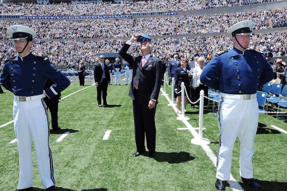 Vice President Joe Biden watches the U.S. Air Force Thunderbrids aerial demonstration teams air show after the graduation ceremonies of the Class of 2009 at Falcon Stadium on the U.S. Air Force Academy campus in Colorado Springs, Colo., May 27, 2009.