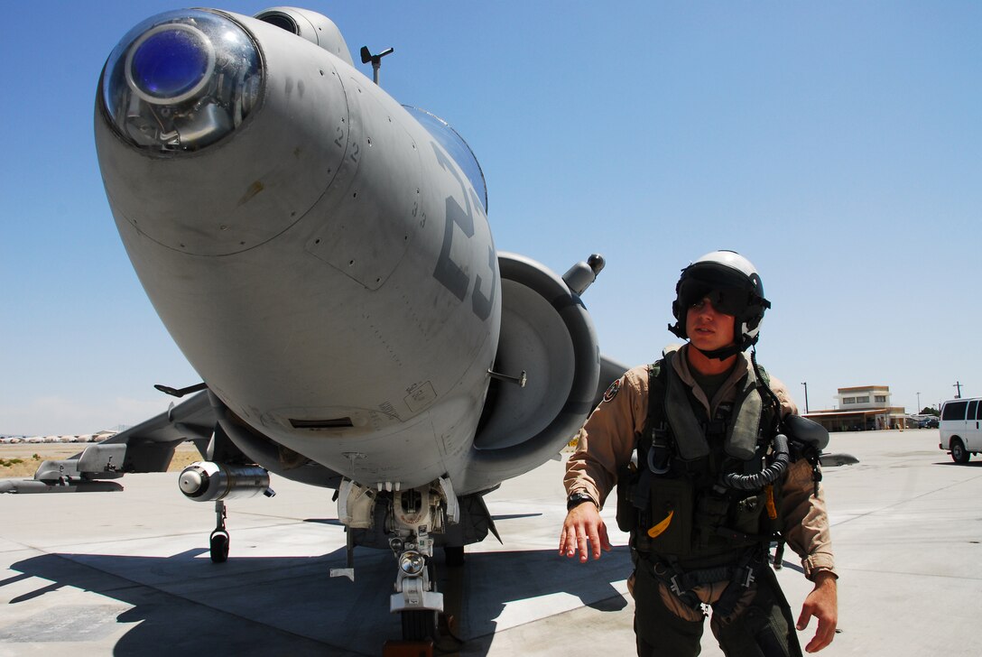 1st Lt. Jarrod Klement, Marine Attack Training Squadron 203 student pilot, inspects his TAV-8B Harrier before departing for his flight from the Marine Corps Air Station in Yuma, Ariz., May 29, 2009. The training squadron comes to Yuma four times a year to sharpen their air-to-ground attack skills, while taking advantage of the air station’s ideal flying conditions and range availability.