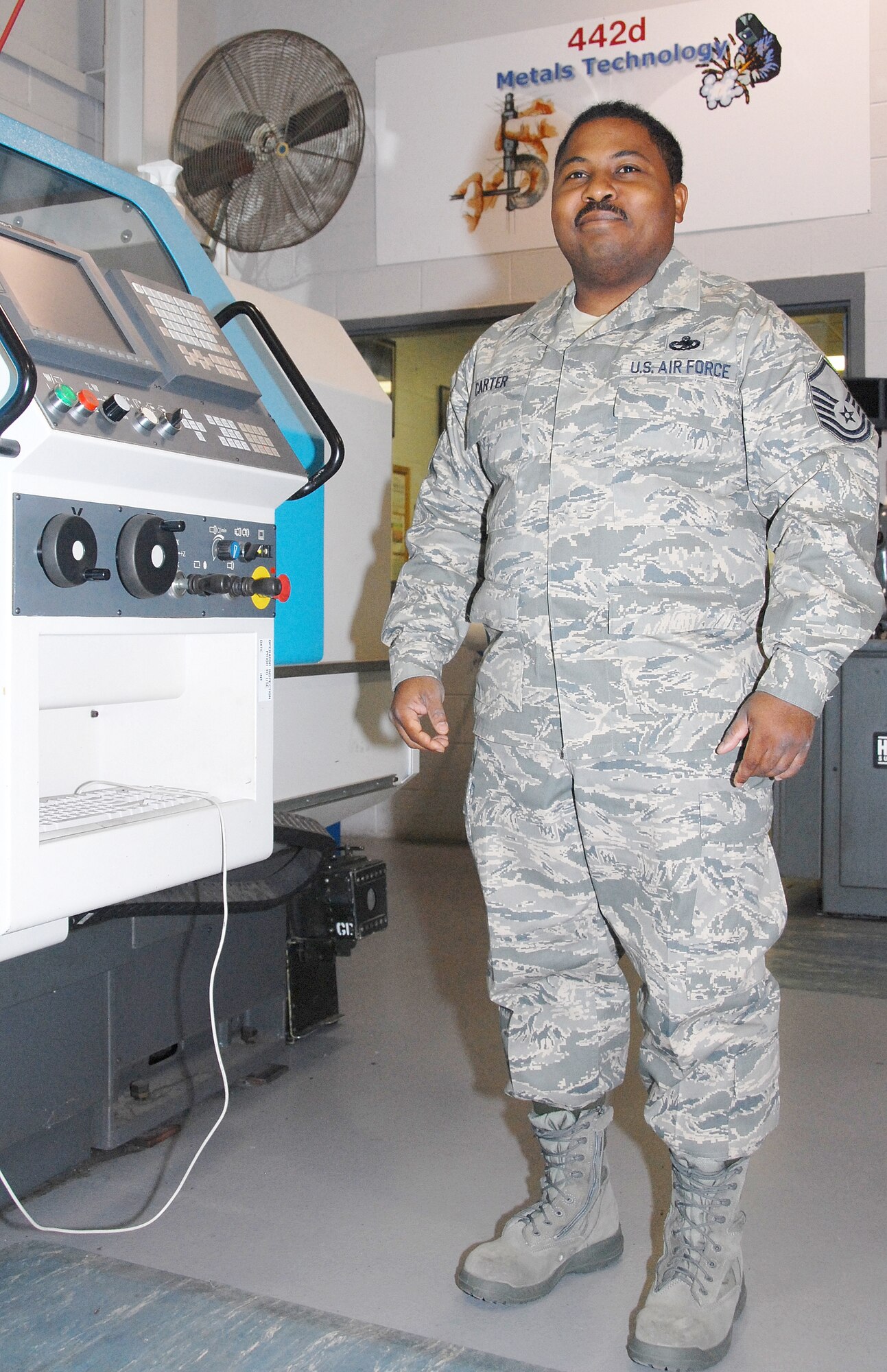 Master Sgt. Calvin Carter's self-aid and buddy care training kicked in as he stopped to assist a stranger incapacitated by physical distress in May. Sergeant Carter's quick thinking got the man to a nearby hospital's emergency room for treatment. The man later recovered. Sergeant Carter, an Air Force reservist, is a Metals Technician assigned to the 442nd Maintenance Squadron, a part of the 442nd Fighter Wing at Whiteman Air Force Base, Mo. The unit flies the A-10 Thunderbolt II aircraft. (US Air Force photo/Staff Sgt. Kent Kagarise)
