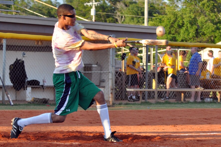 EGLIN AIR FORCE BASE, Fla. – A player from the 96th Force Support Squadron powers through a pitch from Tech. Sgt. Ronnie Hart, 1st Special Operations Maintenance Squadron pitcher, during an American League intramural softball game, May 27. The 1st SOMXS shellacked the 96th FSS, 15-2. (U.S. Air Force photo/ Airman Anthony Jennings)