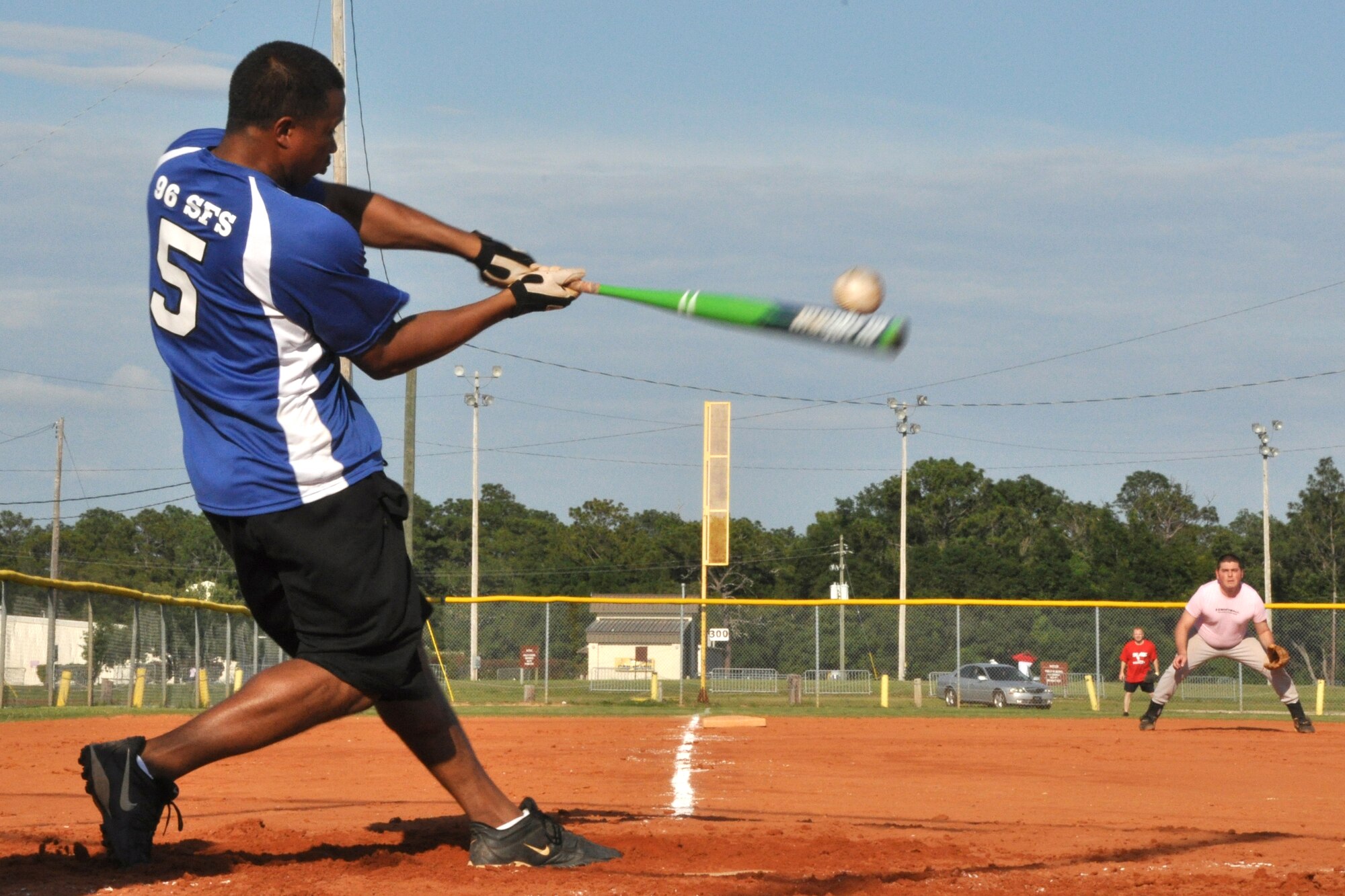EGLIN AIR FORCE BASE, Fla. – Staff Sgt. Christopher Fuquay, 96th Security Forces Squadron Knights team member, hits the ball deep into the outfield during an American League intramural softball game, May 27. The Knights held off the 96th Med Group, 11-9. (U.S. Air Force photo/ Airman Anthony Jennings)