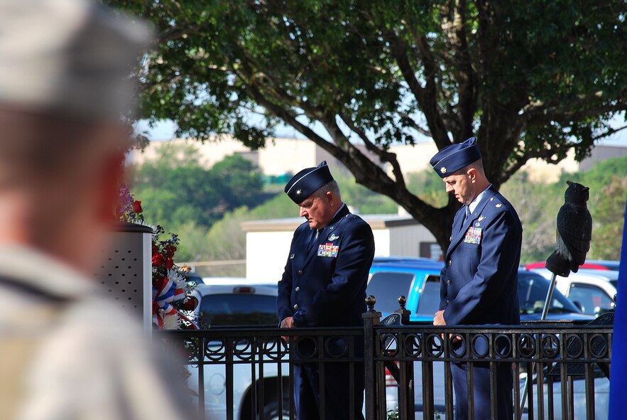 Memorial Day weekend started on Thursday at the 433rd Airlift Wing. Though many Airmen were still working, about 100 Airmen and family members attended a ceremony commemorating 433rd Airlift Wing members who lost their lives in the line of Duty. The remembrance ceremony is an annual tradition that takes place at Memorial Grove. The grove was built to commemorate Airmen killed in a C-5 crash in 1990. (U.S. Air Force Photo/Master Sgt. Collen McGee)