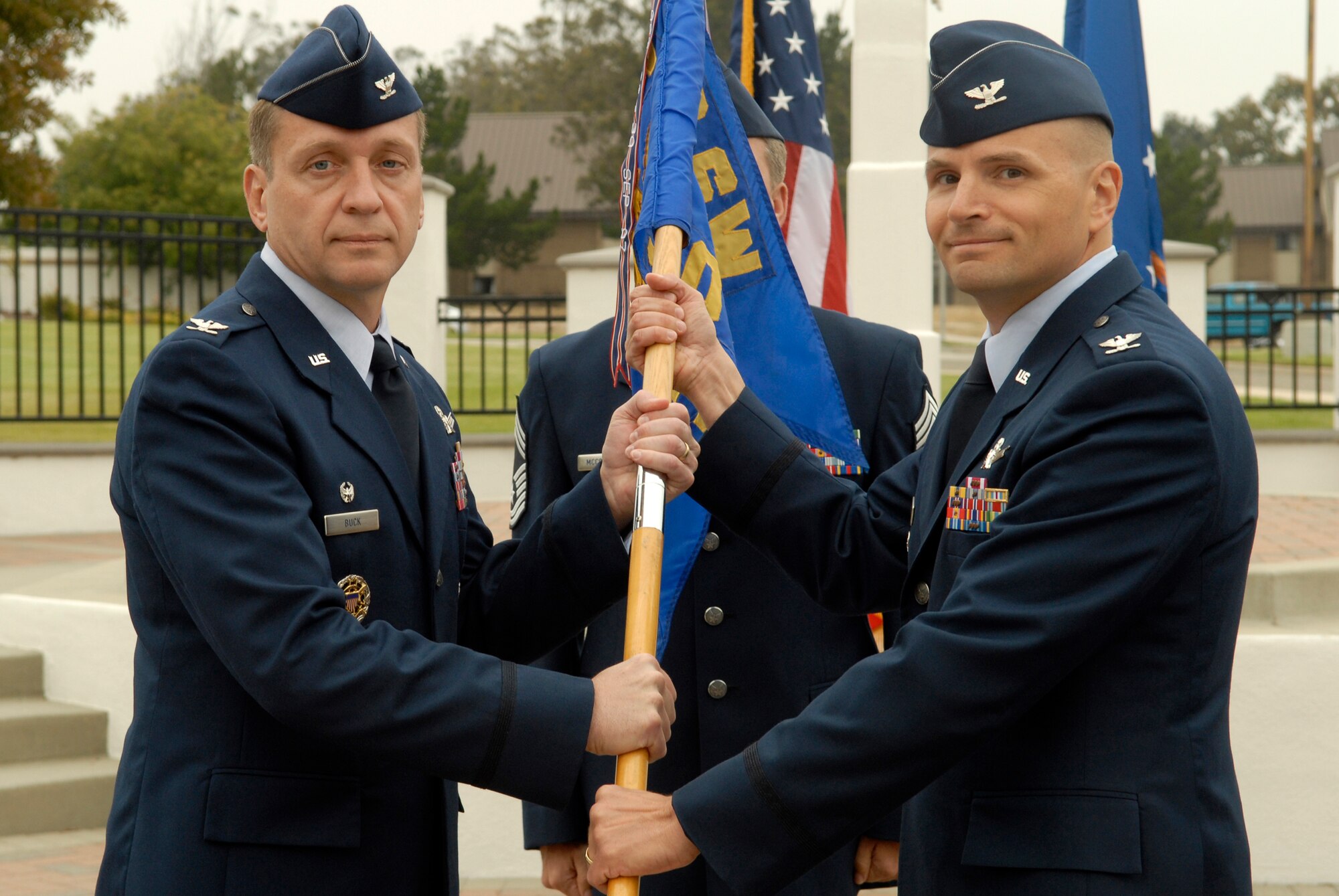 VANDENBERG AIR FORCE BASE, Calif. – Col. David Buck, the 30th Space Wing commander, gives the command of the 30th Operations Group to Col. Todd Gossett during a change of command ceremony here May 29. (U.S. Air Force photo/Senior Airman Christian Thomas)