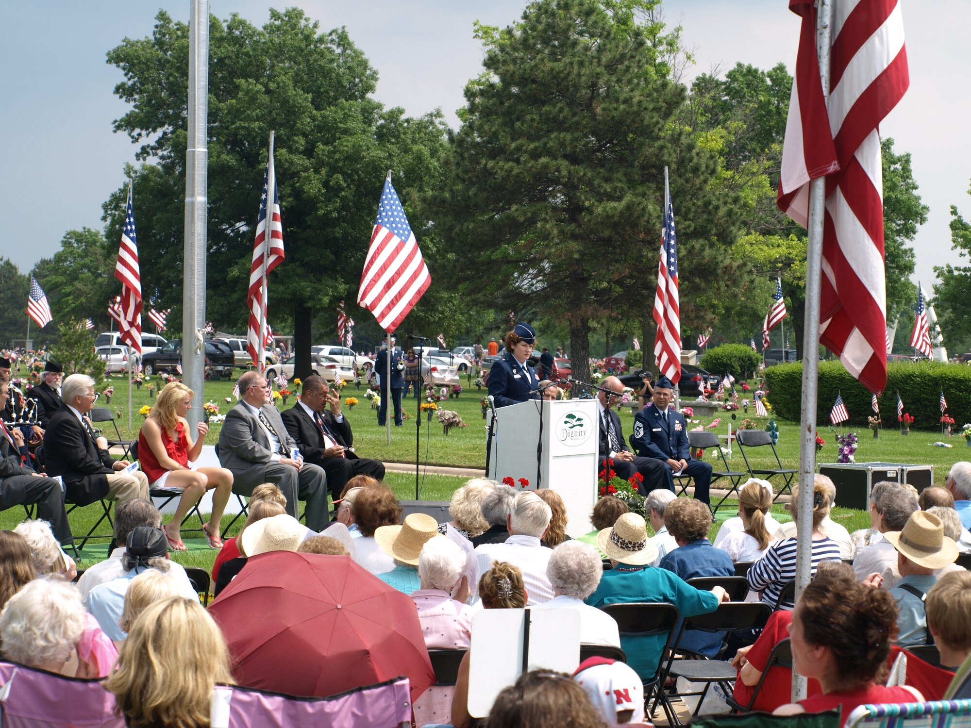 Brig. Gen. Susan Helms, Director of Plans and Policy, U.S. Strategic Command, Offutt AFB, Neb. speaks to hundreds of area residents about her flights in space during the Resthaven Mortuary and Cemetery's Memorial Day service in Wichita, May 25. General Helms is the first U.S. military woman in space and a veteran of five space flights. (photo courtesy of Les Kline)