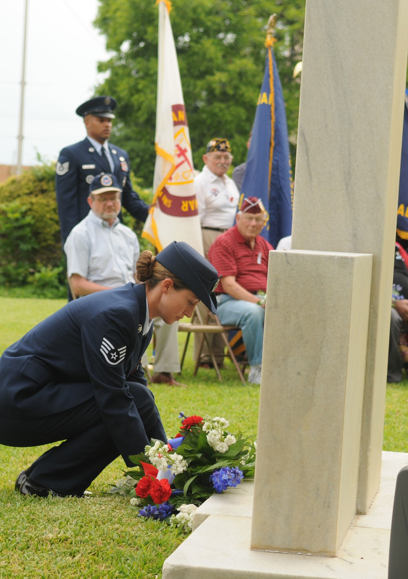 Staff Sgt. Shiala Lane, 17th Force Support Squadron, lays a wreath on the Veterans' Memorial at the Tom Green County Courthouse May 25. (U.S. Air Force photo by Tech. Sgt. John Barton)