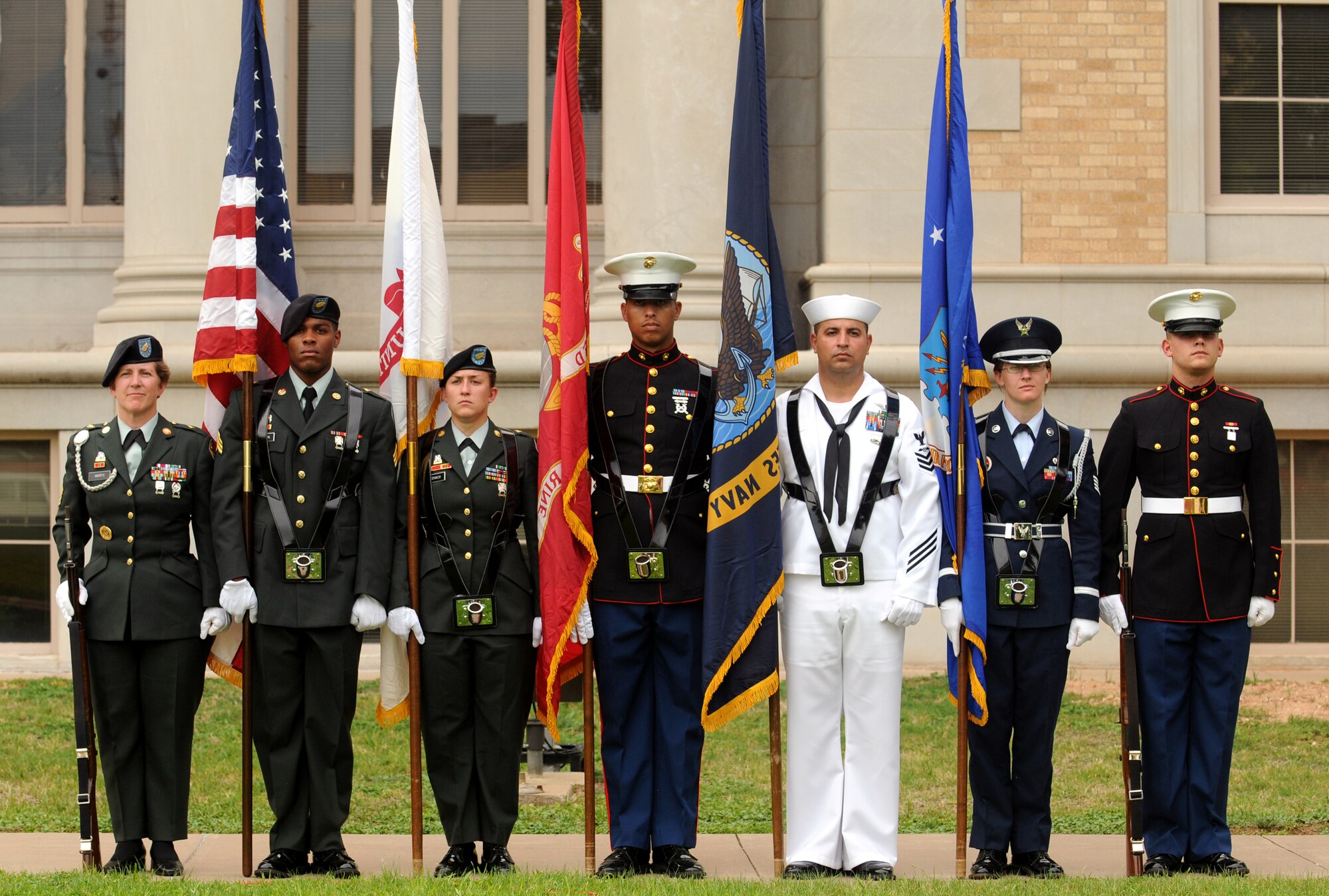 The Goodfellow Air Force Base Joint Service Color Guard stands at attention at the County Courthouse prior to the ceremony May 25. (U.S. Air Force photo by Tech. Sgt. John Barton)