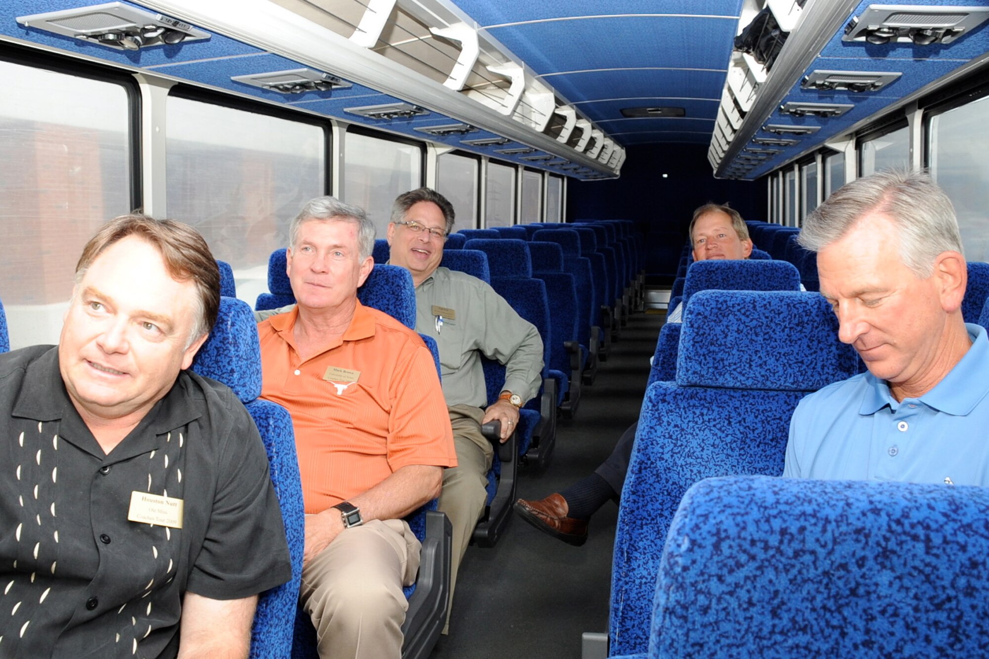 Seven NCAA coaches visited Air Mobility Command headquarters here at the start of Coaches Tour 2009, sponsored by Morale Entertainment, LLC, in association with Armed Forces Entertainment.  From left to right are Houston Nutt, University of Mississippi; 2008 Coach of the Year Mack Brown, University of Texas; Tom Lee, Morale Entertainment, LLC; Rick Neuheisel, UCLA; and Tommy Tuberville, former Auburn University coach.  Other coaches included Jim Grobe, Wake Forest University; Jim Tressel, Ohio State University; and Troy Calhoun, U.S. Air Force Academy.