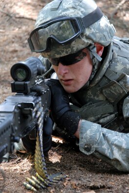 A student in the Air Force Phoenix Warrior Training Course provides security during a training scenario for the course in mounted patrol on May 25, 2009, on a Joint Base McGuire-Dix-Lakehurst, N.J., range.  The course, taught by the U.S. Air Force Expeditionary Center's 421st Combat Training Squadron, prepares security forces Airmen for upcoming deployments. (U.S. Air Force Photo/Staff Sgt. Paul R. Evans)