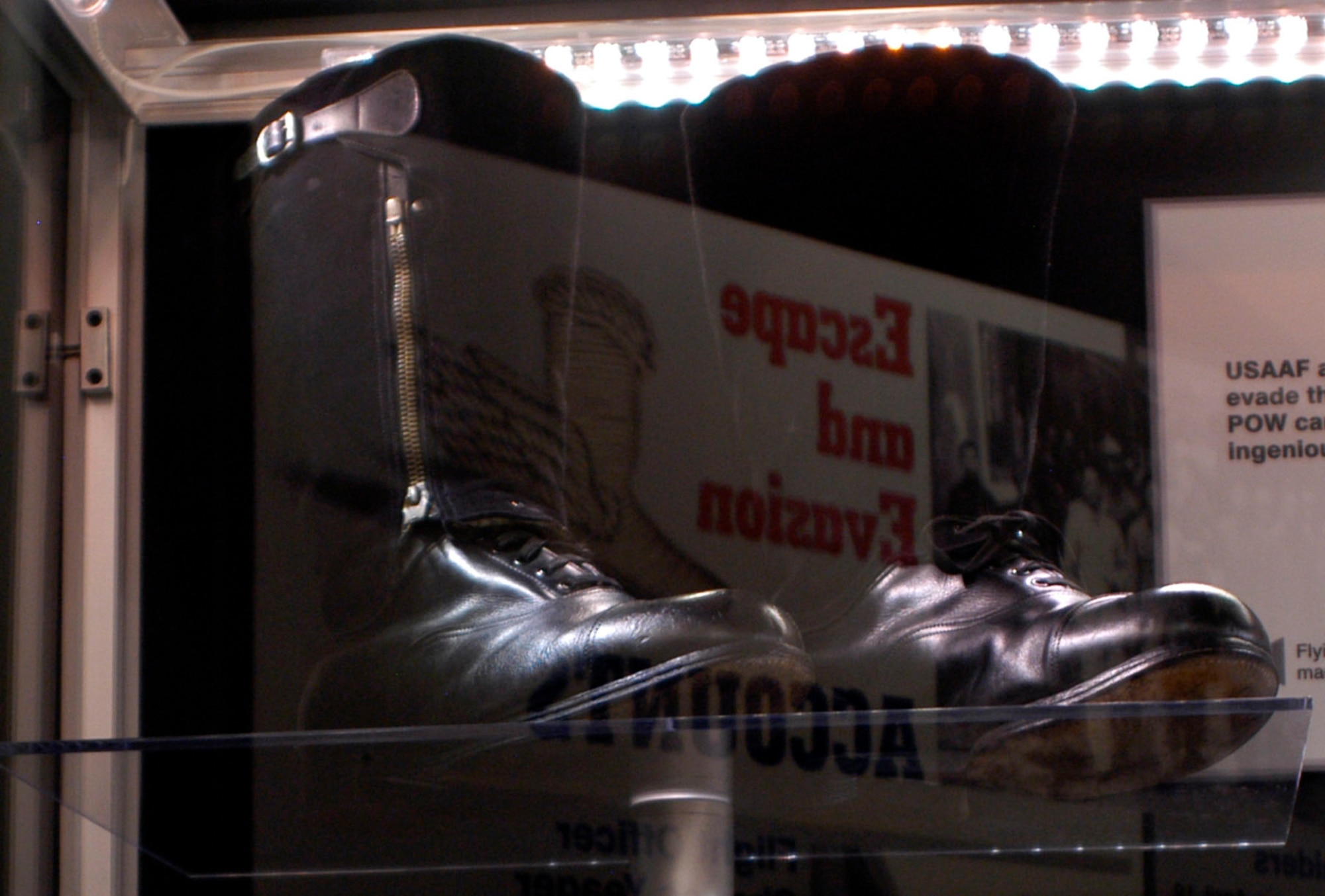 DAYTON, Ohio - Flying boots were a telltale sign of an airman. Equipped with a knife in the bootstrap, these British-made boots appeared to be common walking shoes after the upper portion was cut off. This item is on display in the "Winged Boot: Escape and Evasion in World War II" exhibit in the World War II Gallery at the National Museum of the U.S. Air Force. (U.S. Air Force photo)