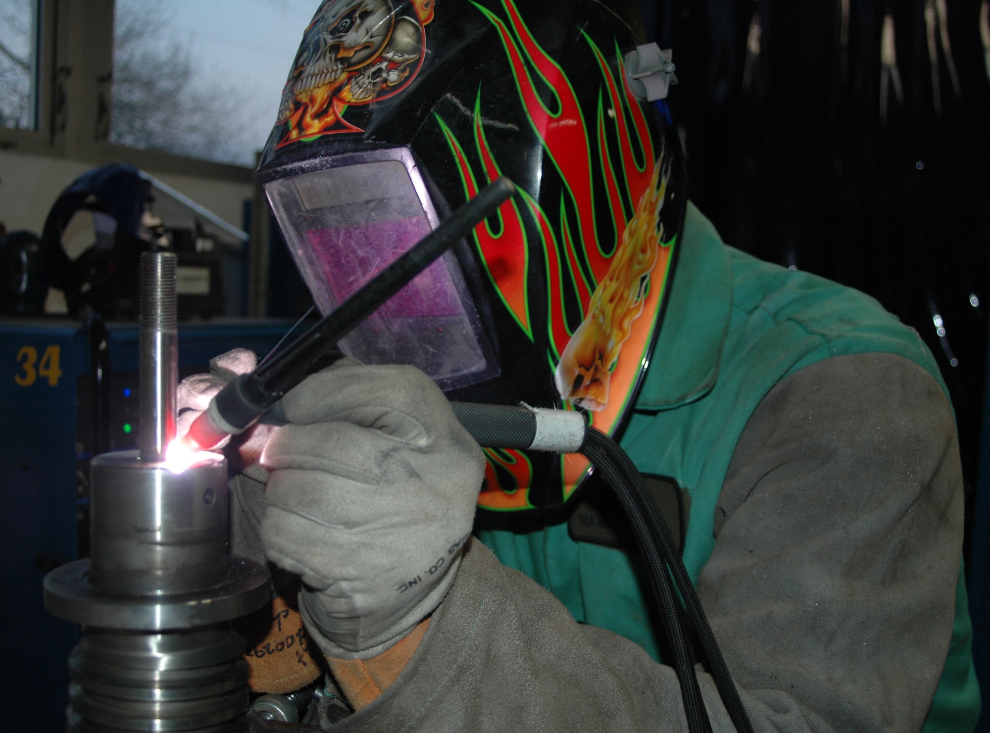 Senior Airman Michael Wright is a welder in the 512th Maintenance Squadron Aircraft Metals Technology Shop and is on orders supporting the 436th MXS Metals Technology Shop here. Shop members make and repair various types of aircraft parts as well as fix aircraft generation equipment, which is used by maintenance members working on the flightline. (U.S. Air Force photo/Capt. Marnee A.C. Losurdo)
