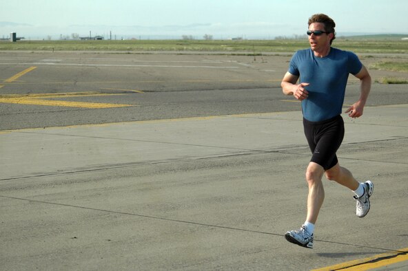 Eric Thayer, 341st Force Support Squadron family readiness consultant, nears the finish line during an Air Force physical fitness test May 19 on the flight line. Mr. Thayer scored 100 points clinching his fifth consecutive perfect score in as many years. (U.S. Air Force photo/Senior Airman Dillon White)