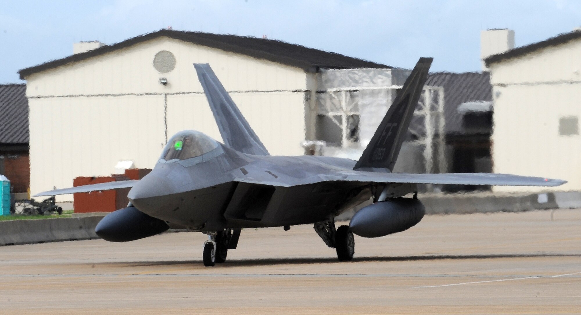 An F-22 Raptor from the 94th Fighter Squadron taxies in preparation for departure May 26 from Langley Air Force Base, Va., to Kadena Air Base, Japan. More than 280 Langley AFB Airmen and 12 F-22s depart this week for an air and space expeditionary force deployment, which demonstrates the continued U.S. commitment to fulfill its security responsibilities throughout the Western Pacific. (U.S. Air Force photo/Senior Airman Zachary Wolf) 
