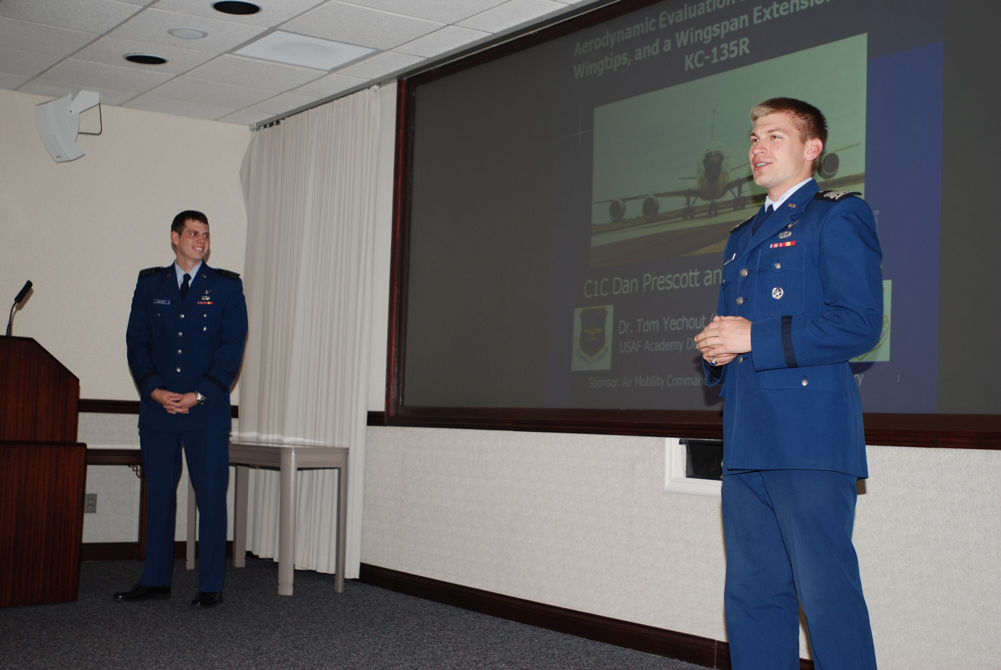Cadets offer insight into renewable energy sources and fuel efficiency for AMC.
SCOTT AIR FORCE BASE, Ill. -- U.S. Air Force Academy Cadets recently briefed AMC leaders on ways the command might be able to use renewable energy sources and save fuel. Cadets 1st Class were asked by AMC to find ways to make the KC-135 Stratotanker more fuel efficient.  Daniel Prescott and Joel Hapert focused on winglets, wing tips and wing extensions to not just save fuel but to save money and increase the life of the fleet.  In a different study, AMC had cadets use Travis AFB as their case study for renewable resources being used on bases.  Kimberly Hale, Kyle Rainwaters, Matt King and Bryan Rocco each focused on a specific resource including solar, wind, biofuel and nuclear power.  Lt. Gen. Vern Findley, AMC vice commander, said he was very impressed with the cadets and their presentation.  “This has been very productive.  This is all great stuff,” he said.  “Your work will have lasting benefits as we continue to explore alternate energy sources throughout the command.   We need to capture this information so future cadets can continue to build on what you have started.”   