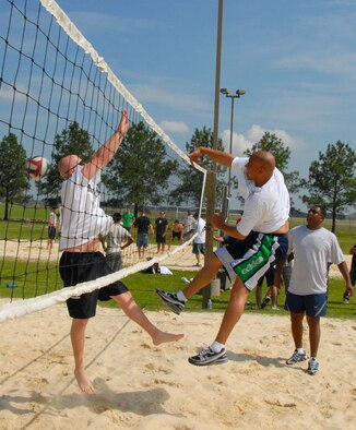 Volleyball, a run and a balloon toss were some of the events that highlighted the 42nd Air Base Wing picnic and sports day May 15 at Hopper-Lodge. Following the opening remarks from Col. Kris Beasley, 42nd ABW commander, the day began with a 5K fitness run and moved on to a health information fair, sporting and children events. After lunch, wing chiefs and first sergeants took on the commanders in a volleyball match, and the day culminated in recognizing volunteers for the event. (U.S. Air Force photo/Jamie Pitcher) 