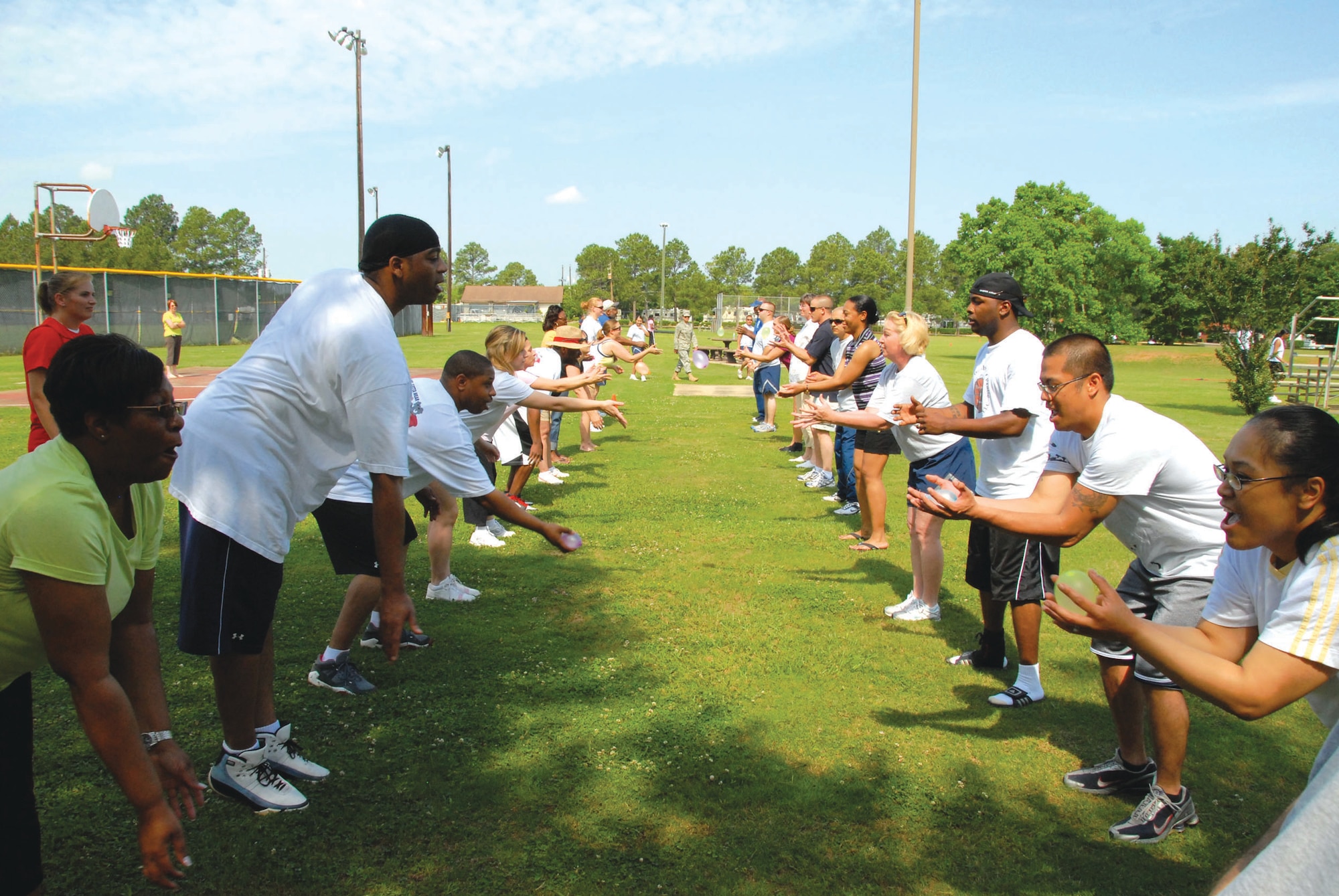 Volleyball, a run and a balloon toss were some of the events that highlighted the 42nd Air Base Wing picnic and sports day May 15 at Hopper-Lodge. Following the opening remarks from Col. Kris Beasley, 42nd ABW commander, the day began with a 5K fitness run and moved on to a health information fair, sporting and children events. After lunch, wing chiefs and first sergeants took on the commanders in a volleyball match, and the day culminated in recognizing volunteers for the event. (U.S. Air Force photo/Jamie Pitcher) 