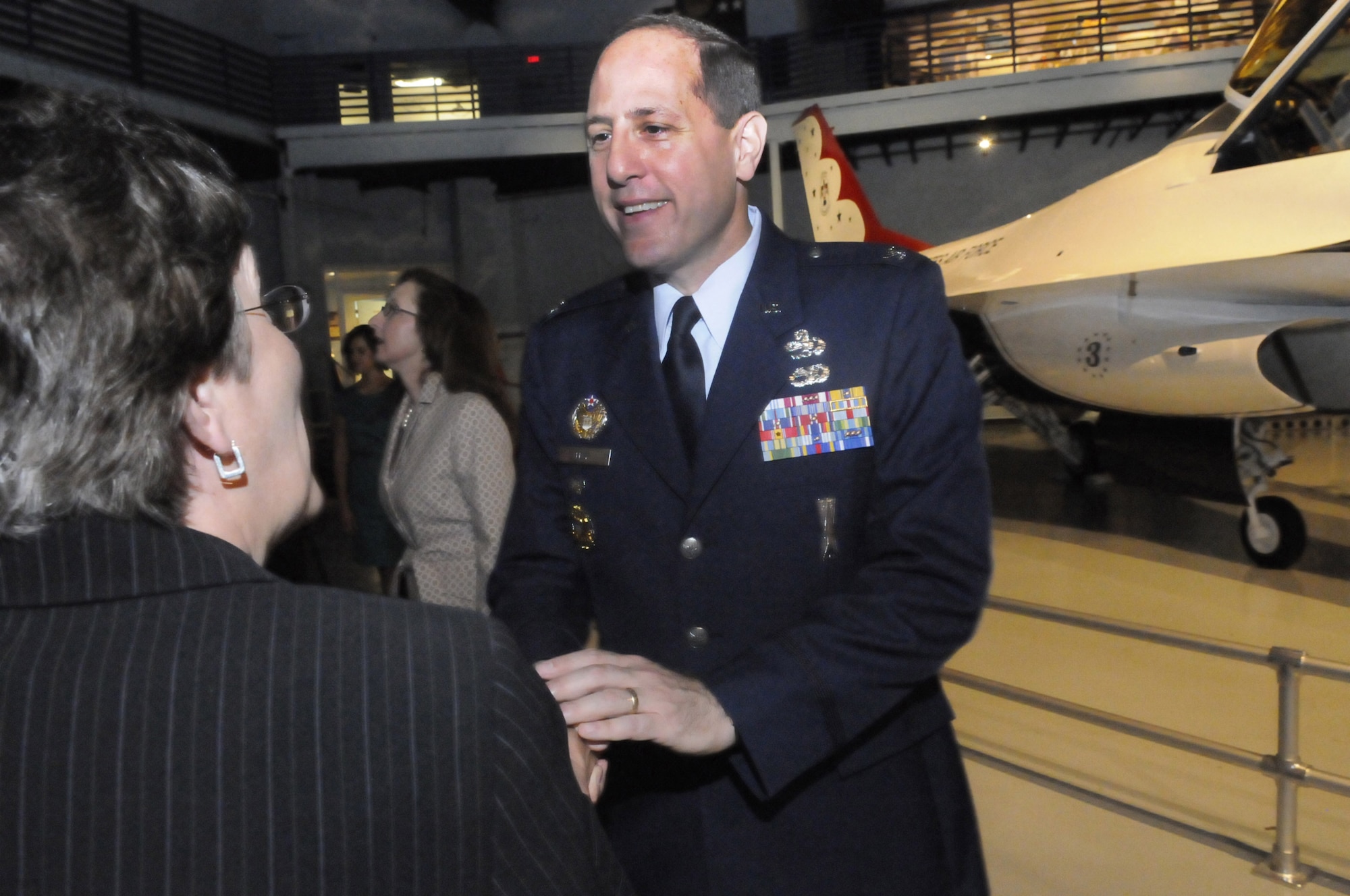 Colonel Lee K. Levy, II, new 402nd Maintenance Wing commander greets people at a reception after the change of command ceremony Tuesday. U. S. Air Force photo by Sue Sapp