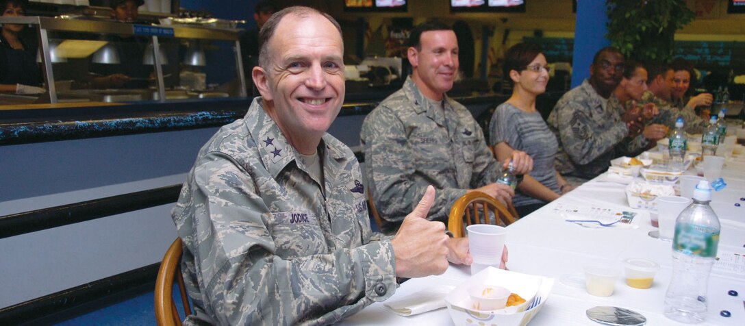 Major Gen. Ralph Jodice, Air Force District of Washington commander, along with other Andrews leaders, gets a taste of proposed lunch items at the Andrews Bowling Center Cafe’ 300, May 19. In addition to the taste test, the leadership also attended a meeting to determine future menu changes and facility upgrades. (U.S. Air Force photo/ Bobby Jones)