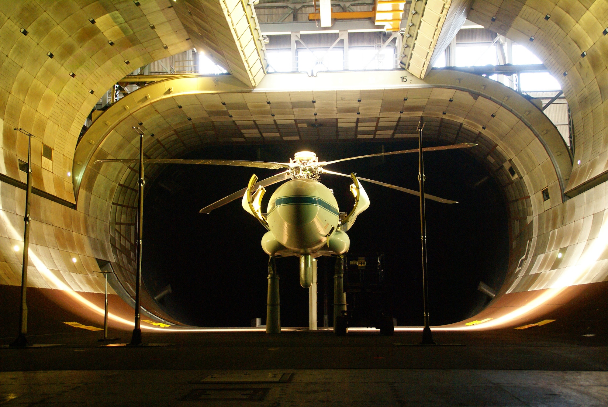 The UH-60 rotor is mounted on the Large Rotor Test Apparatus during testing of the Individual Blade Control system at Arnold Engineering Development Center’s National Full-Scale Aerodynamics Complex’s 40 by 80-foot wind tunnel. (Photo by Philip Lorenz III)