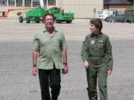 SEYMOUR JOHNSON AIR FORCE BASE, N.C. -- Col. Caroline Evernham, 916th Operations Group commander, escorts Mr. Barry Williams, actor, on a tour of the 916th Air Refueling Wing. Mr. Williams is best known for his role as Greg Brady in the Brady Bunch and flew with the Air Force Reserve wing in 2007.