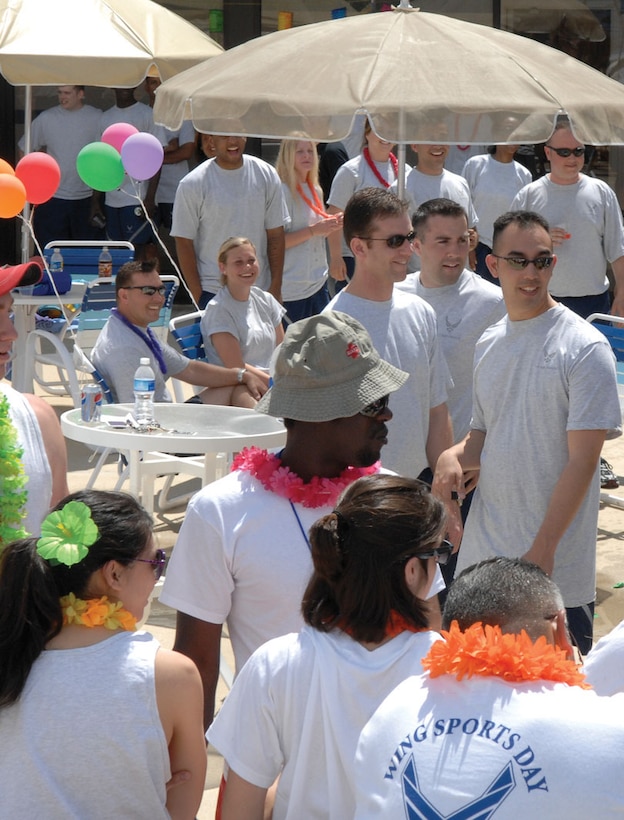 Team Andrews members who were guests at the Asian-Pacific Islander festival, gathered to officially kick off summer with food, fun and entertainment at the Gateway Pool. (U.S. Air Force photo/ Staff Sgt. Melissa Stonecipher)